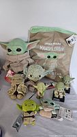 Group shot of full ten-piece Yoda & Grogu lot