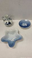 Group shot of three porcelain pieces
