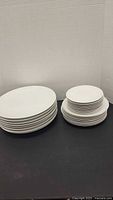 Stack of dinner and salad plates