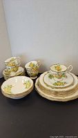Group of Royal Albert Tea Rose cups, saucers, bowls and plates