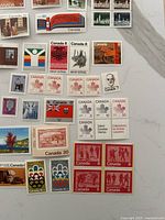 Overview of assorted Canadian mint stamps laid out