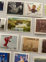 Close-up of various 35¢ and 15¢ Canadian stamps