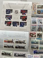 Overview of NHL sheet, locomotive sheet, assorted 34¢ blocks and single commemoratives