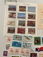 Full pane of twenty 30¢ Canadian Art stamps and surrounding singles