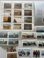 Overview showing artwork stamp block, lighthouse blocks and assortment of individual commemoratives