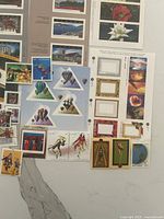 Close-up of various 2001 mint Canadian stamp sheets and blocks