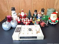 Group shot of all items including candles, holders and figurines