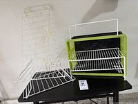 Hat rack, crate and shelf risers on table