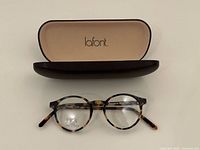 Eyeglass frame with open lafont case