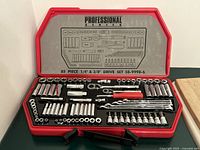 Open red Mastercraft Professional Series case showing full 85-piece socket and ratchet set