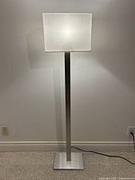 Full view of lamp lit, showing design and condition