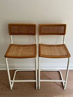 Front view of both bar stools showing overall design and materials