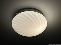 Light mounted on ceiling, illuminated