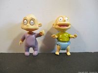 Front view of both Rugrats figures standing