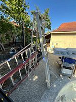 Full view of aluminum step ladder folded open