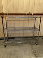 Full view of chrome rack on casters