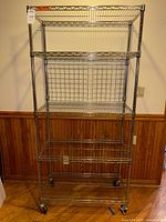 Front view showing full rack with five shelves and casters