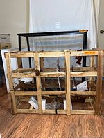 Full view of display case and crated model ship