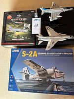 overview showing two assembled jets, Kinetic Tracker kit, Corgi Mig-21 kit, third kit partly visible