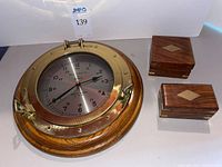 Ship's clock with two wooden boxes
