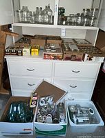 Overall view of jars on dresser and bins