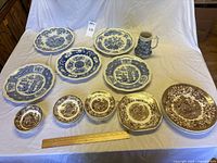 Full lot showing Spode plates, Wedgwood dishes and Old Foley pitcher