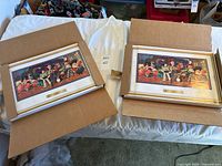 Two open cartons showing stacks of Toy Story 2 posters
