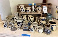 Group shot showing full assortment of blue floral stoneware pieces