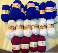 Front view showing all yarn balls arranged by colour