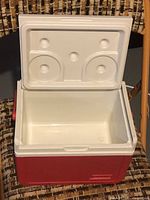 Cooler open showing clean interior and lid design