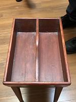 Top view showing two-section tray and wood grain