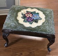 Full view of foot stool showing top and legs