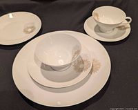 close-up of place setting showing sunburst design