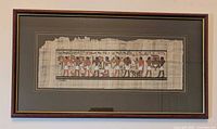 Full framed papyrus artwork mounted on wall