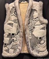 Front view of handmade faux-fur vest showing lining and pockets