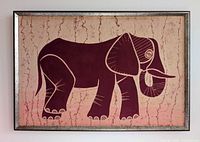 Front view of framed elephant batik showing full artwork and frame