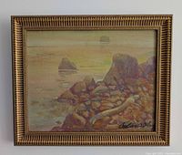 Full view of framed seascape painting