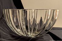 Side profile showing vertical panels and clarity of crystal bowl