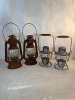 All four lanterns grouped showing sizes and styles