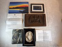 Overview of all five art pieces laid out on table