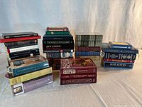 All books grouped showing variety of classic titles and bindings.