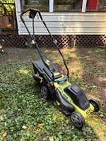 Radley lawnmower full view with bag attached