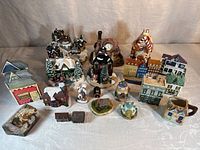 Full grouping of approximately twenty assorted miniature houses and accessories