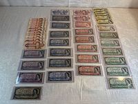 Overview of all Bank of Canada notes laid out in rows