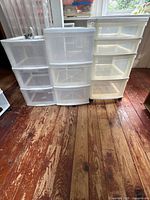 Front view of all three plastic drawer cabinets side by side