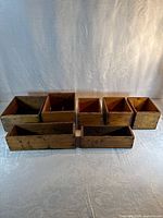 All seven wooden crates grouped