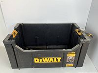 Perspective view of DeWalt DS280 open tool tote showing overall condition and logo