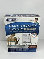 Front of retail box showing Dr. Ho's Pain Therapy System 4 Pad