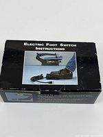Closed box displaying Electric Foot Switch Instructions graphic