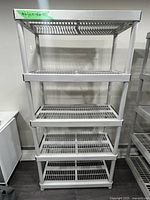 Front view showing five shelves and overall structure